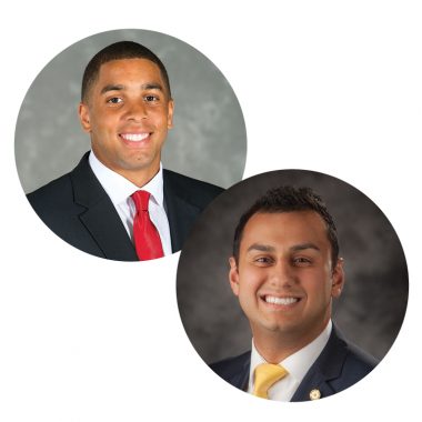 Two portraits inset into one image. The portrait on the left features a smiling man with medium-brown skin and short, dark hair wearing a black suit with a red tie. The portrait on the right features a smiling man with light-brown skin and short, dark hair wearing a black suit with a gold tie.